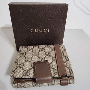 Gucci trifold wallet
